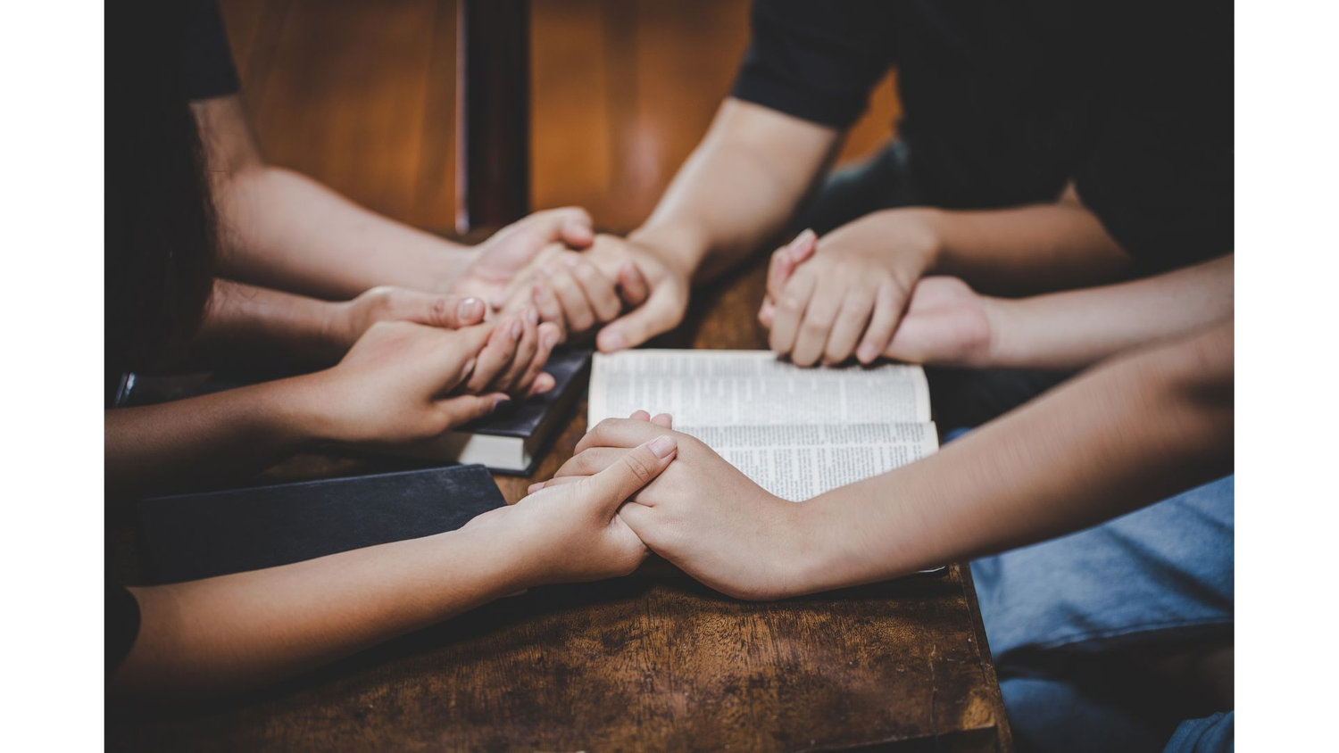 group prayer hands