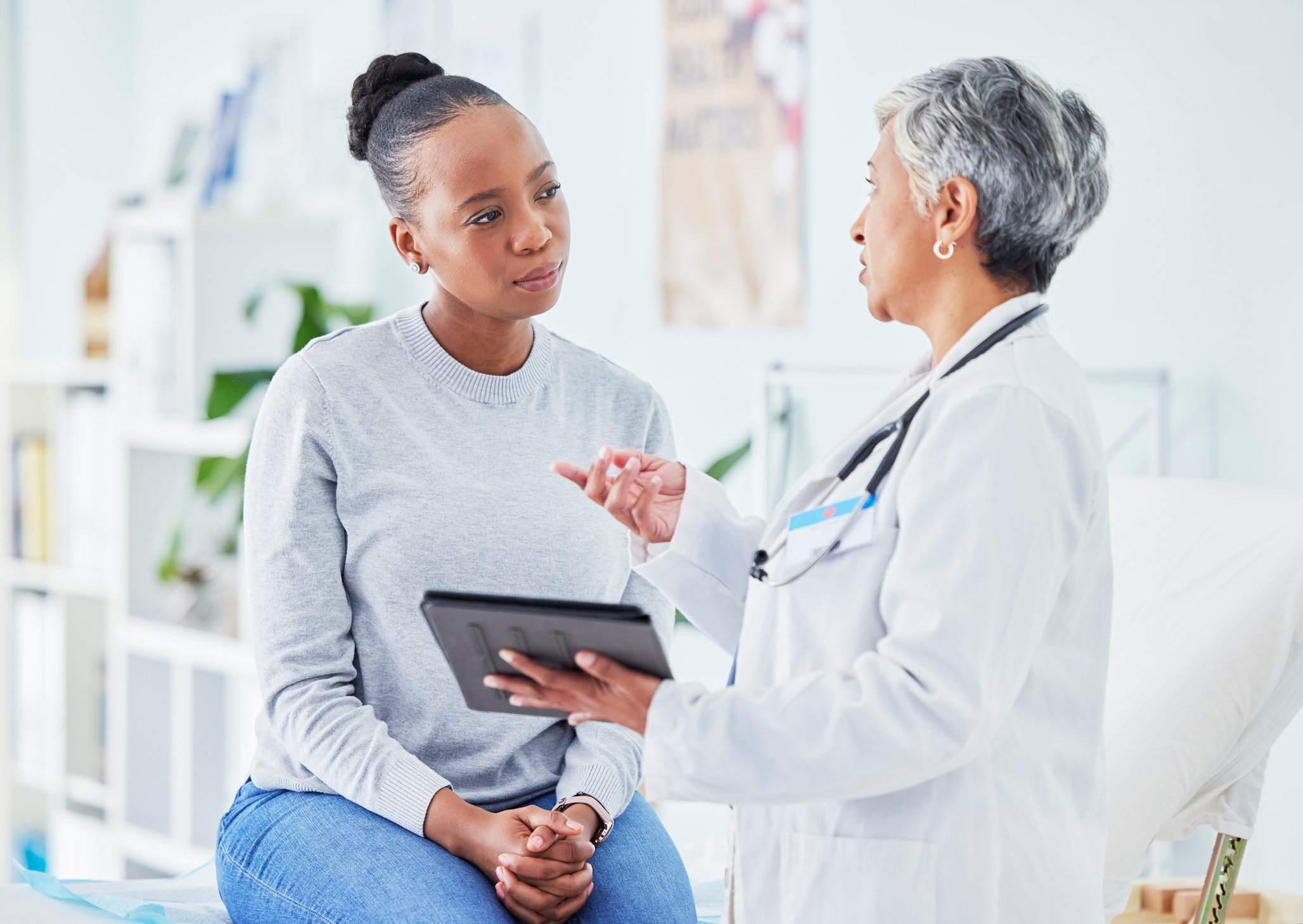 Patient speaking with a physician about personalized concierge care